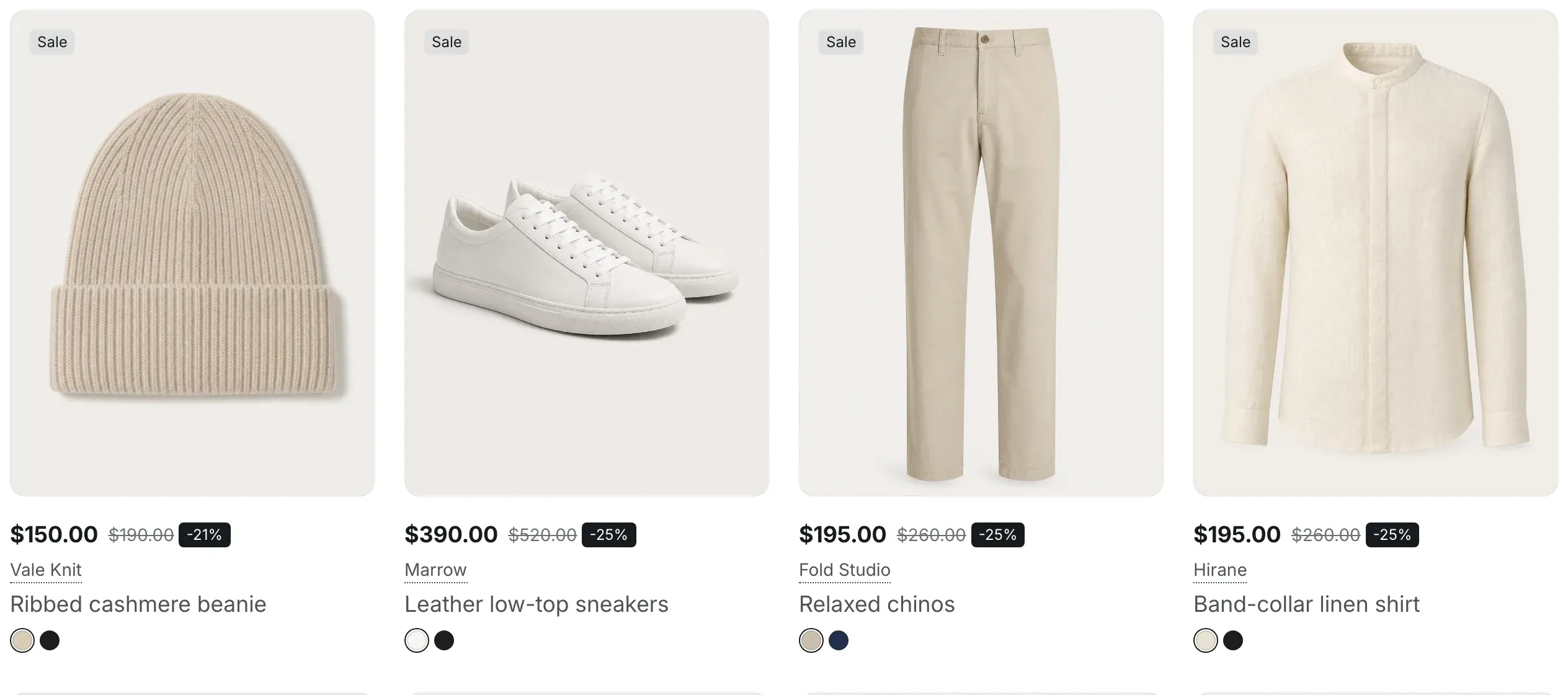 Four product cards from a sale collection, each with a Sale label in the top-left corner of the image, a reduced price, the old price struck through and a dark discount badge such as -25%, and color swatches under the title.