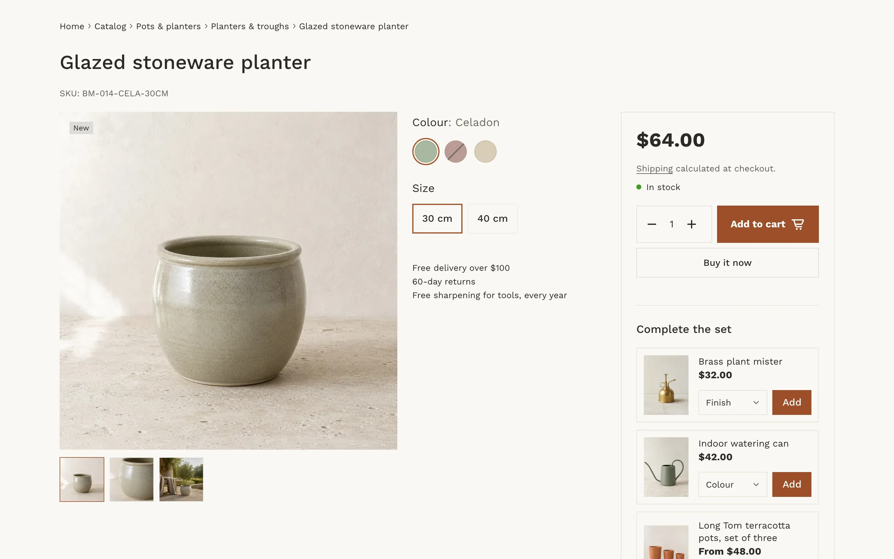 Showcase layout: the product title and SKU across the top, then three columns: a large image with three thumbnails below it, a middle column with color swatches, size buttons and a short text, and a framed box with the price, In stock status, quantity, Add to cart, Buy it now and a Complete the set list.
